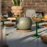 bol vormige kaars met onderzetter buiten rustik lys