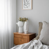 witte vaas met gezicht